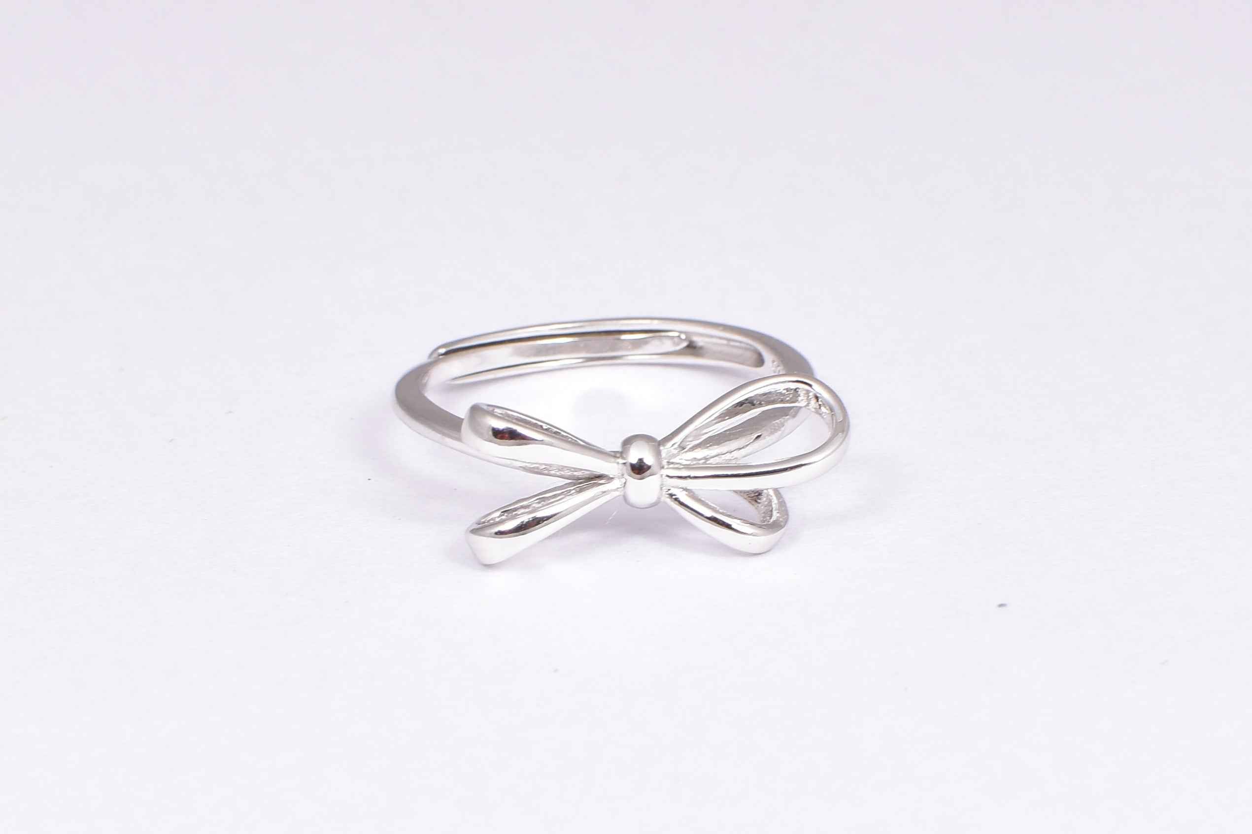 Adjustable Sterling Silver Bow Accent Ring