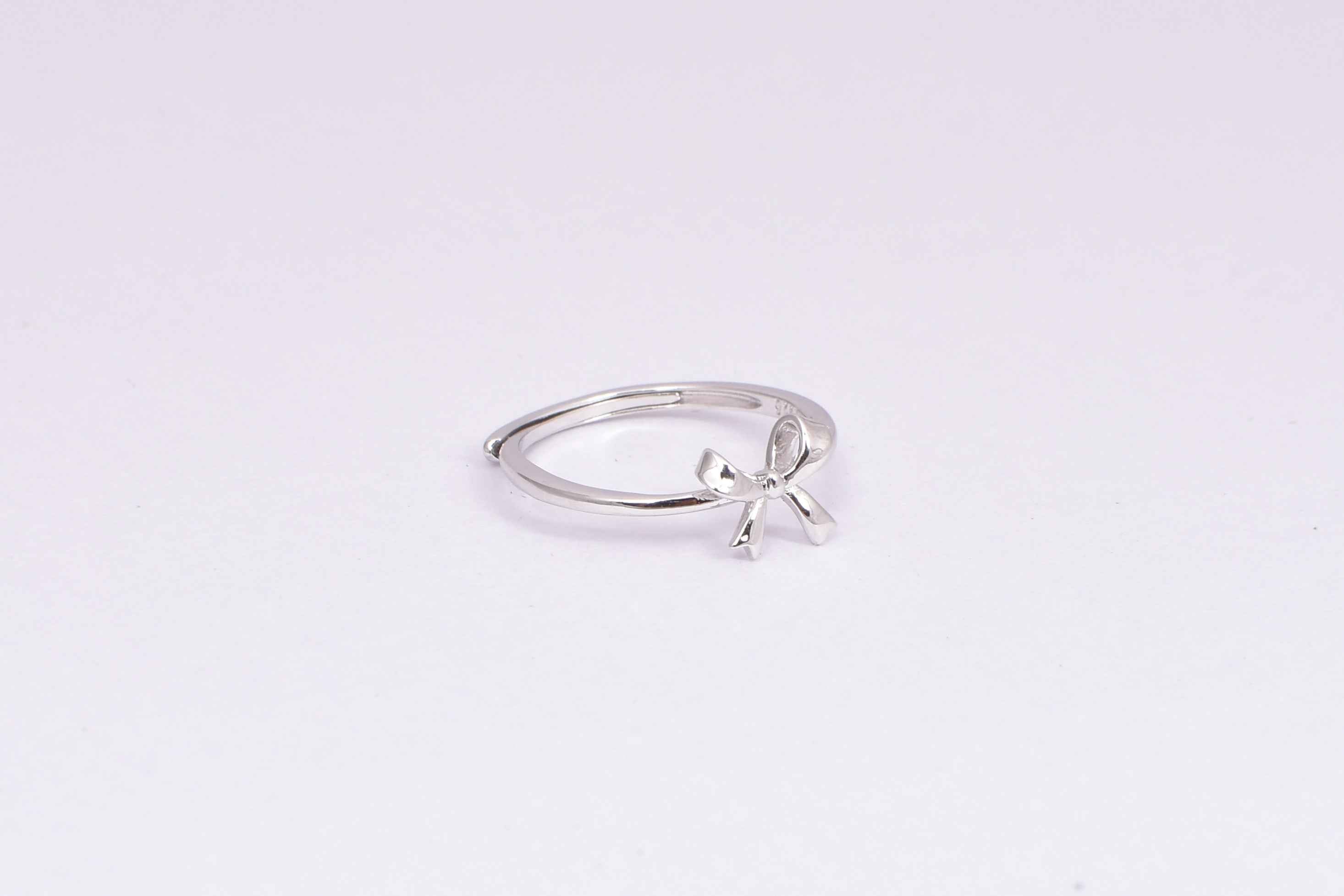 Delicate Silver Bow Accent Ring for Women