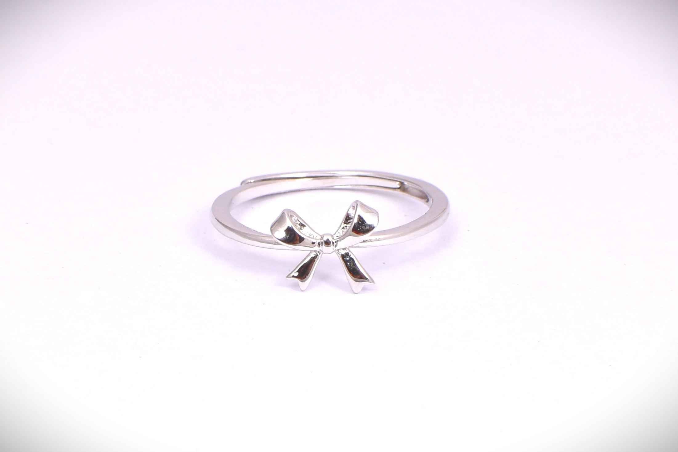 Delicate Silver Bow Accent Ring for Women