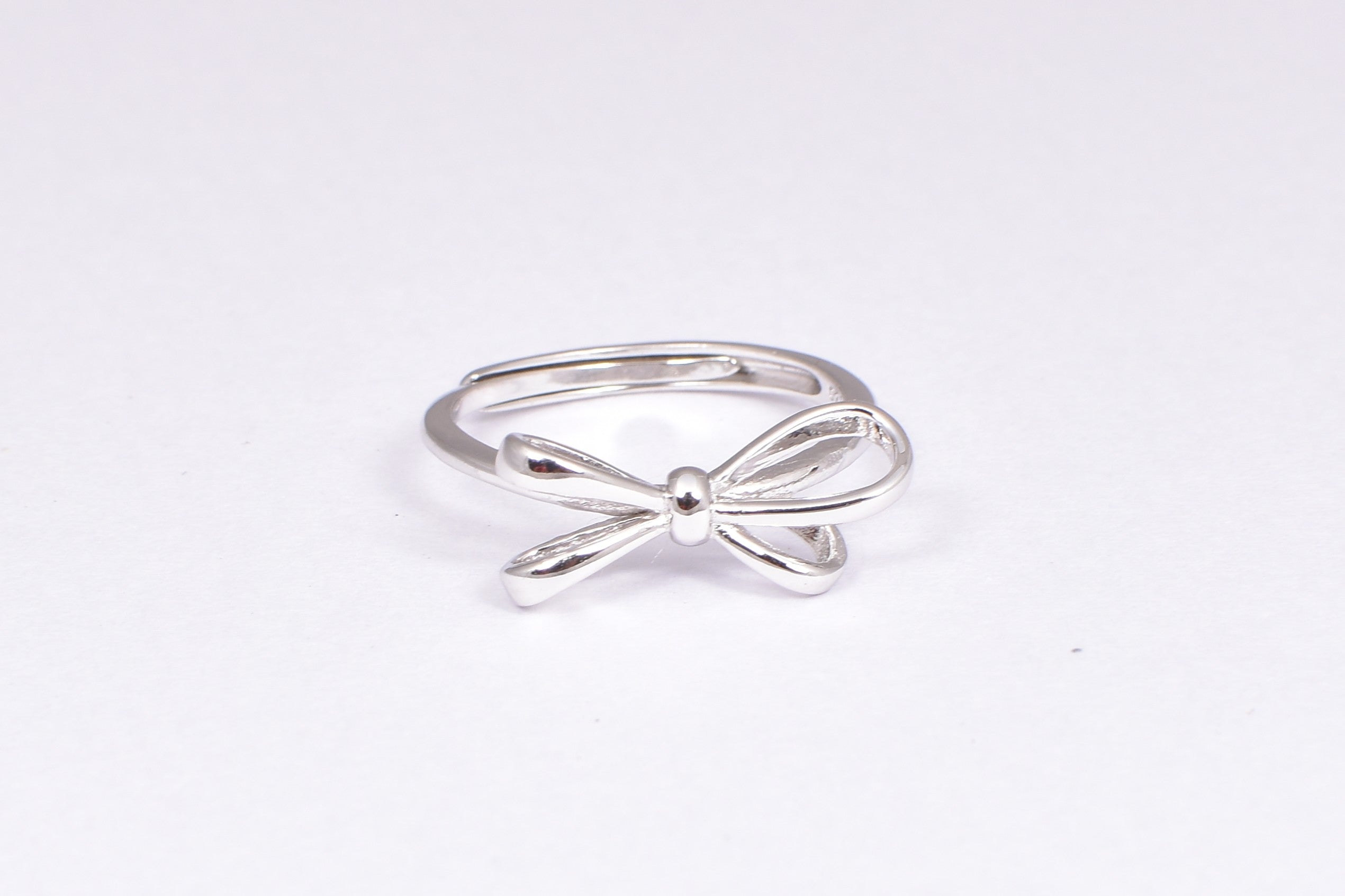 Adjustable Sterling Silver Bow Accent Ring
