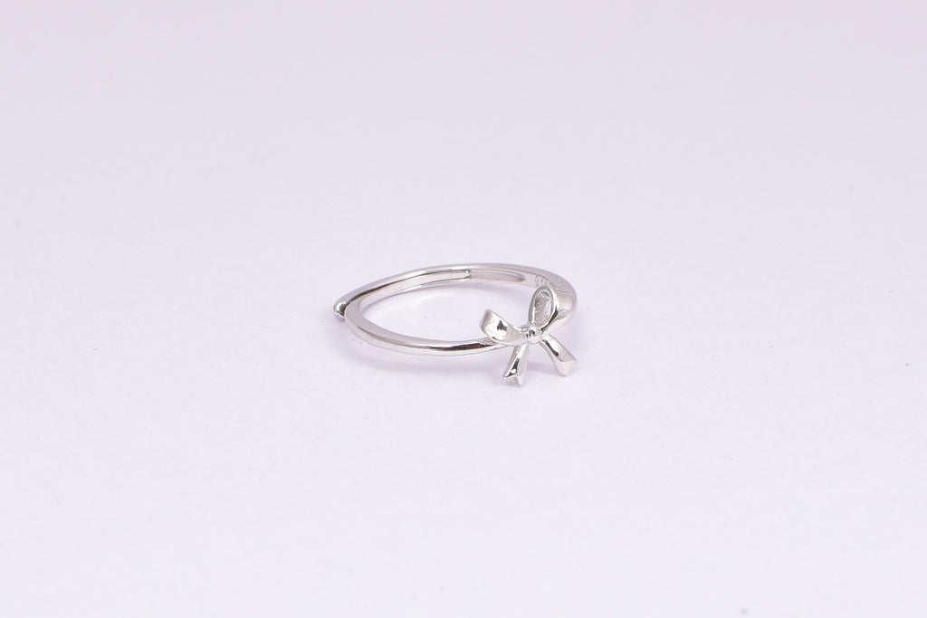 Delicate Silver Bow Accent Ring for Women