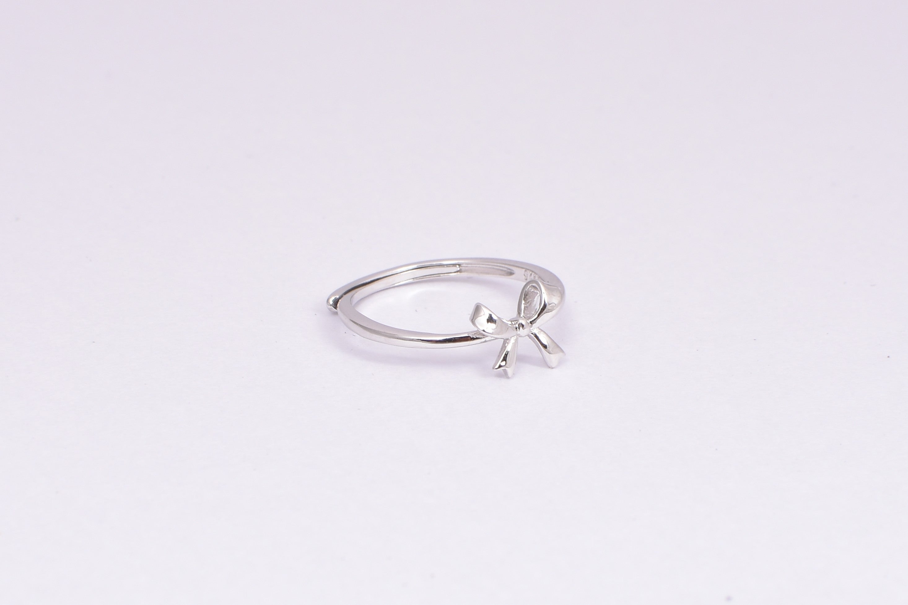 Delicate Silver Bow Accent Ring for Women