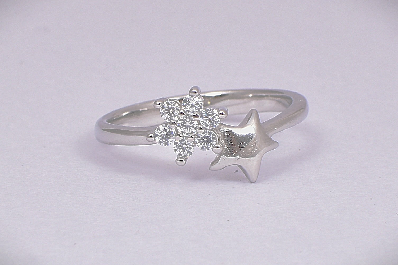 Sterling Silver Star & Snowflake CZ Ring